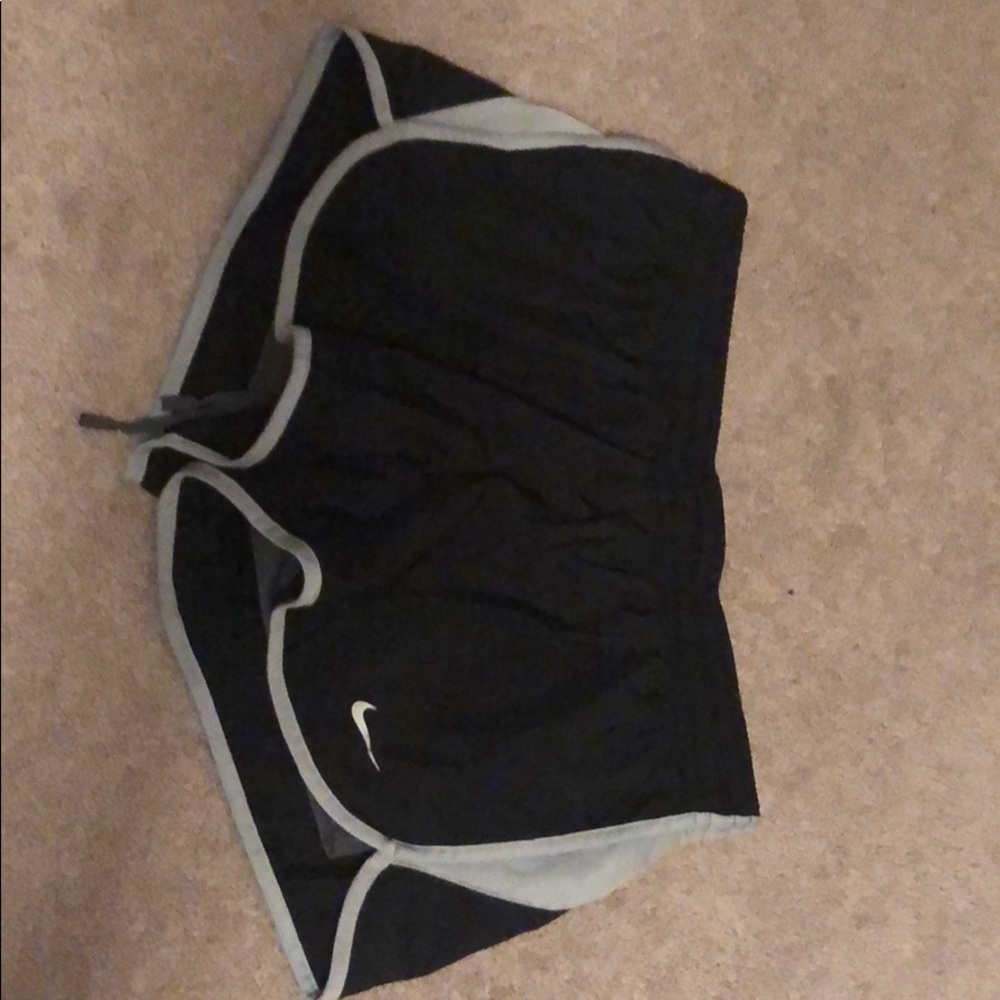 Dry fit running shorts with adjustable waist.